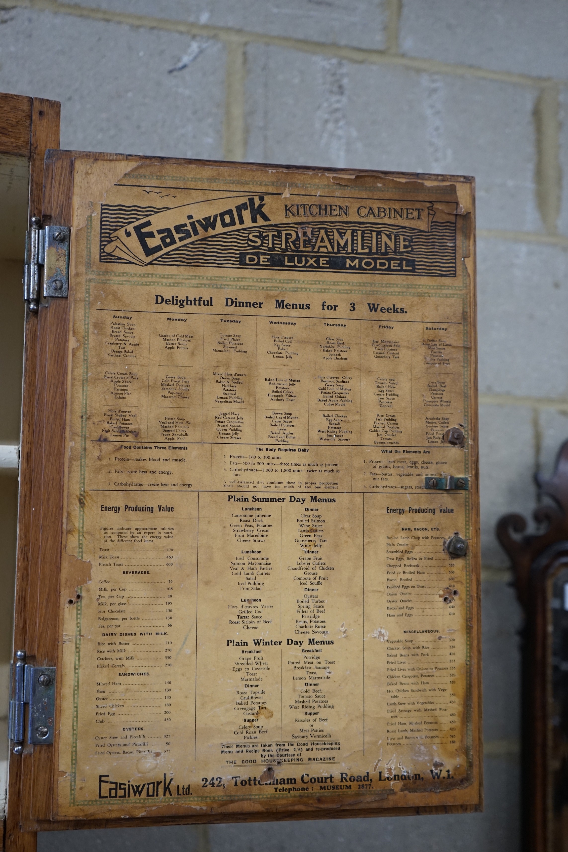An early 20th century oak 'Easiwork' enamel top kitchen cabinet Streamline Deluxe model, length 110cm, depth 64cm, height 198cm